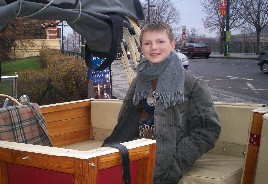 Sebastian in an old car