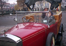 Sebastian in an old car