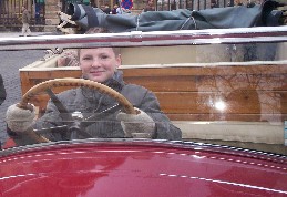 Sebastian in an old car